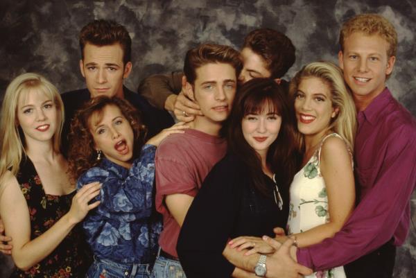 The Beverly Hills, 90210 cast poses for a portrait on set, September 1991 in Los Angeles, California. 